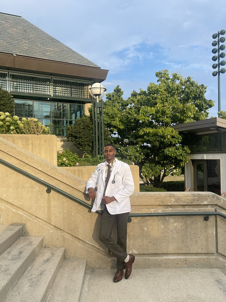 __ahmedx26's tweet photo. In honor of officially being coated and forever being remembered by my classmates as “the guy that wore a Gucci belt to our ceremony”🫡🥼🤣 to 4 more years of being a student and a lifetime after that!🥳👨🏾‍⚕️ #BlackMed2026 #MedTwitter https://t.co/VXO60OkEgG