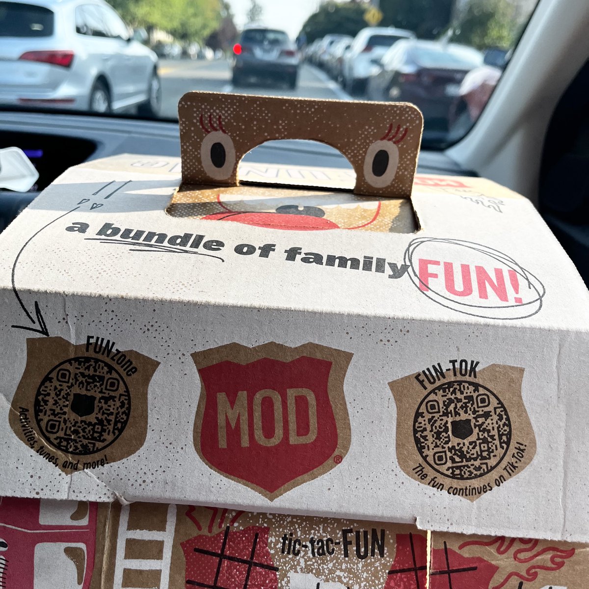 somecody's tweet photo. The #MODFUNdle is finally out in the world!!! 

It's not a BORING family bundle like those other guys serve. It's wrapped up in games, activities, jokes, downloadable content and more. 

The most FUN I've ever had writing for anything 🤪 Go pick one up today! https://t.co/O7qkXQ5x4K