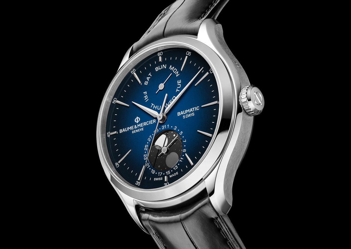 time_watches's tweet photo. #BaumeetMercier presented a new variation of its #Clifton #Baumatic Day-Date #Moonphase adorned for the first time with a gradient blue lacquered dial. Powered by a manufacture movement boasting a 5-day autonomy and attractively priced. Read more at https://t.co/Hyx945rBTn https://t.co/4JrhLjs0D7
