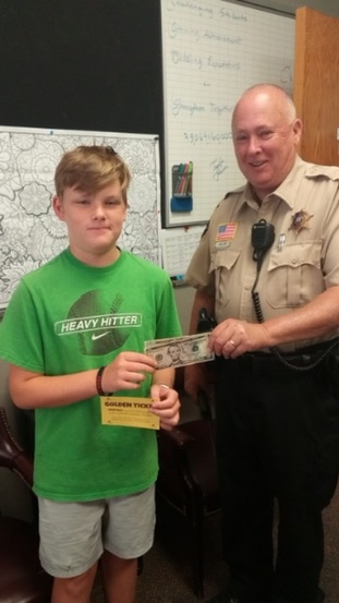 Friday we had our first Golden Ticket winner!  This student won $25.🤑There are 6 more Golden🎟️.  Get your box of Candy and help us reach our goal of $10,000.  Remember, if you reach $16,000, you get to duct tape all 3 administrators to the wall and throw dodge balls at them.