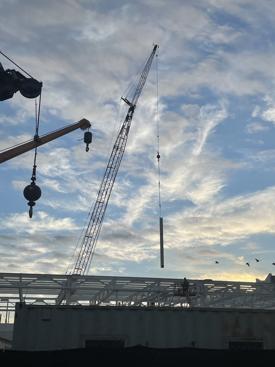 Matturoffact's tweet photo. I’m no architectician but that’s gotta be a lightning rod, or a support beam for one is my guess! Expansion in progress #REVC! @ironbp25 amirite? @TheIronworkers @iw25app #F150Lightning @FordTrucks @WeAreFord @FordInsider @jimfarley98 https://t.co/4rbAhAxjbf