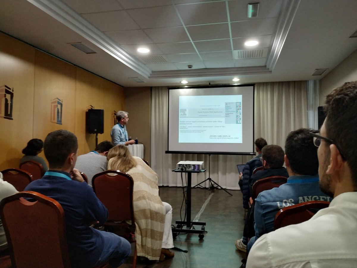 andresjram's tweet photo. Carmelo (@ES3_Group/@unisevilla) is presenting our approach to generate enactment plans from declarative models considering rolling planning horizons and complex temporal constraints. At #JCIS2022 (@sistedes2022 @sistedes). With @irene_barbar  @bweber12 @manfredreichert https://t.co/CtCmvTwiey
