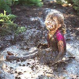Izzy and jade playing in mud