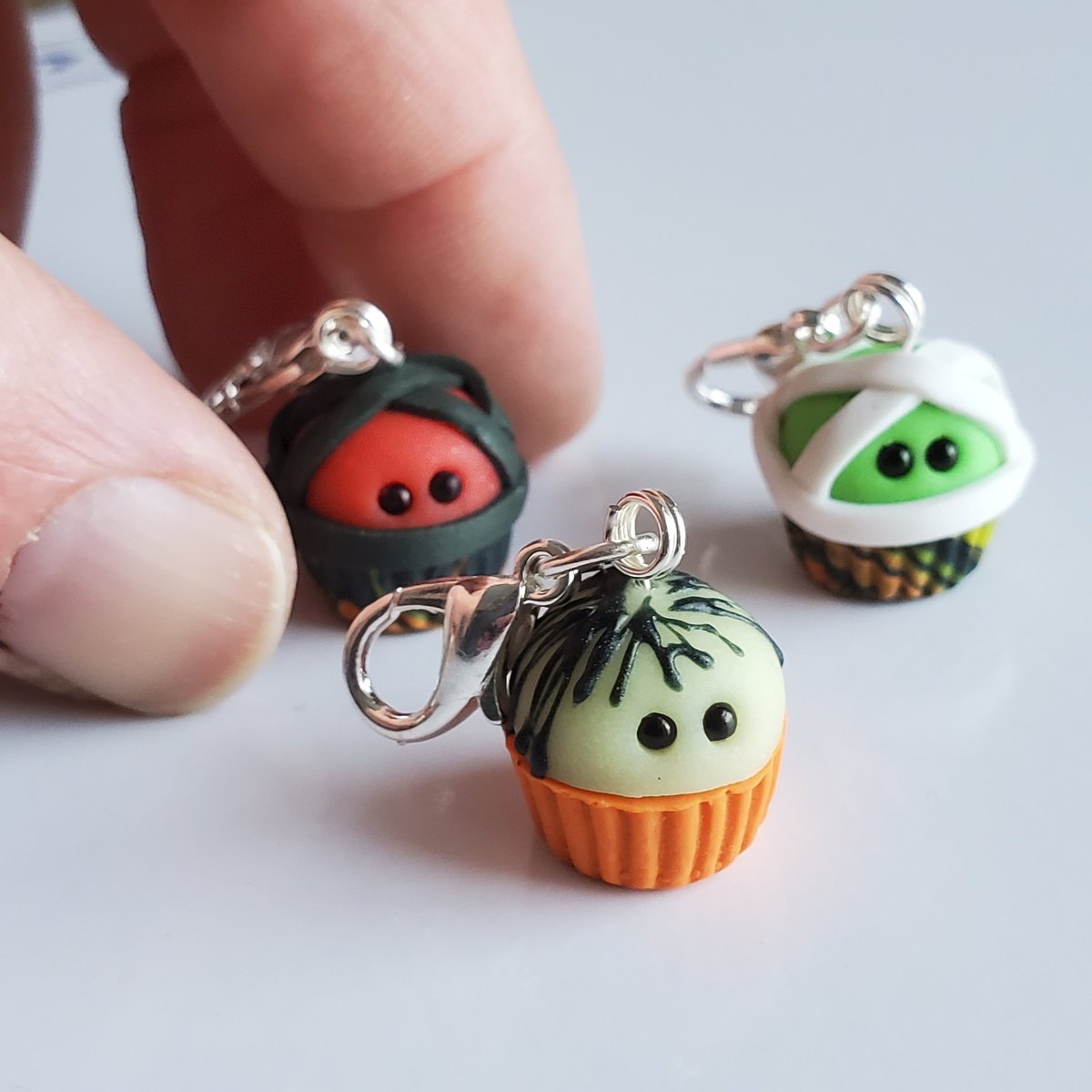 cheryl_c45's tweet photo. Halloween stitch markers. The hairy one glows in the dark! 
#StitchMarker #knitting #PolymerClay https://t.co/ImGsTIAqnC