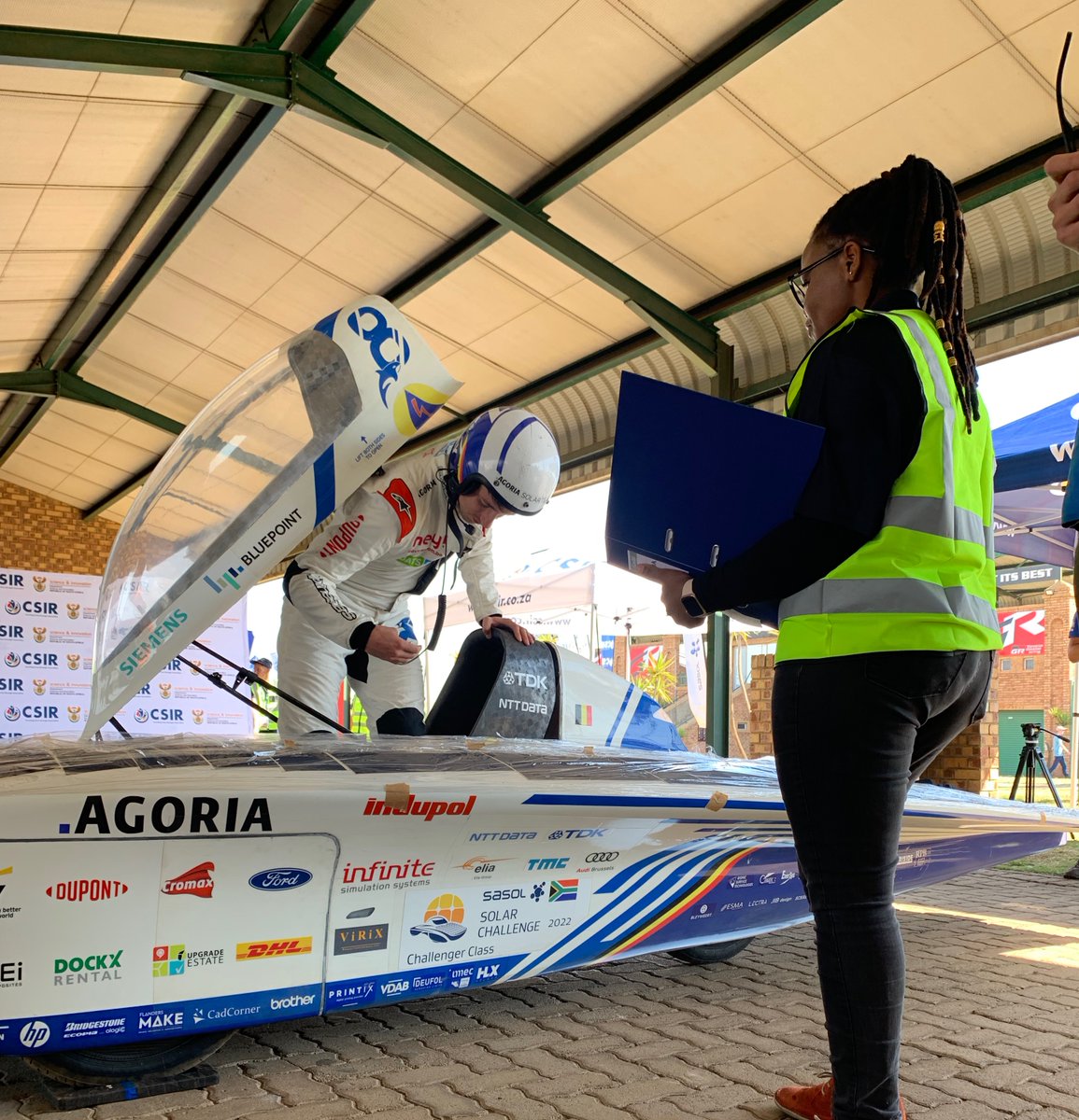 Solar_Challenge's tweet photo. @solarteam_be  at the driver operations station on day 1 of static scrutineering. 
  
Can you guess how much time they have to exit the solar car incase of an emergency? 

 #SasolSolarChallenge #SolarChallenge #SolarCar #STEM #CSIR #CTrack #RedStarRaceway https://t.co/ykanGAzuYD