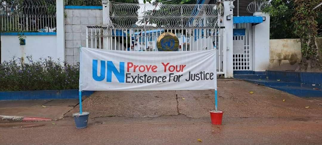 KMohsoe's tweet photo. Anti-coup revolutionary banner was hung at the front of @UNinMyanmar office in Yangon.  #2022Sept4Coup #AcceptNUGRejectMilitary #UKyawMoeTunIsOurAmbassador #WhatsHappeningInMyanmar https://t.co/Xy7JGz4Kdh