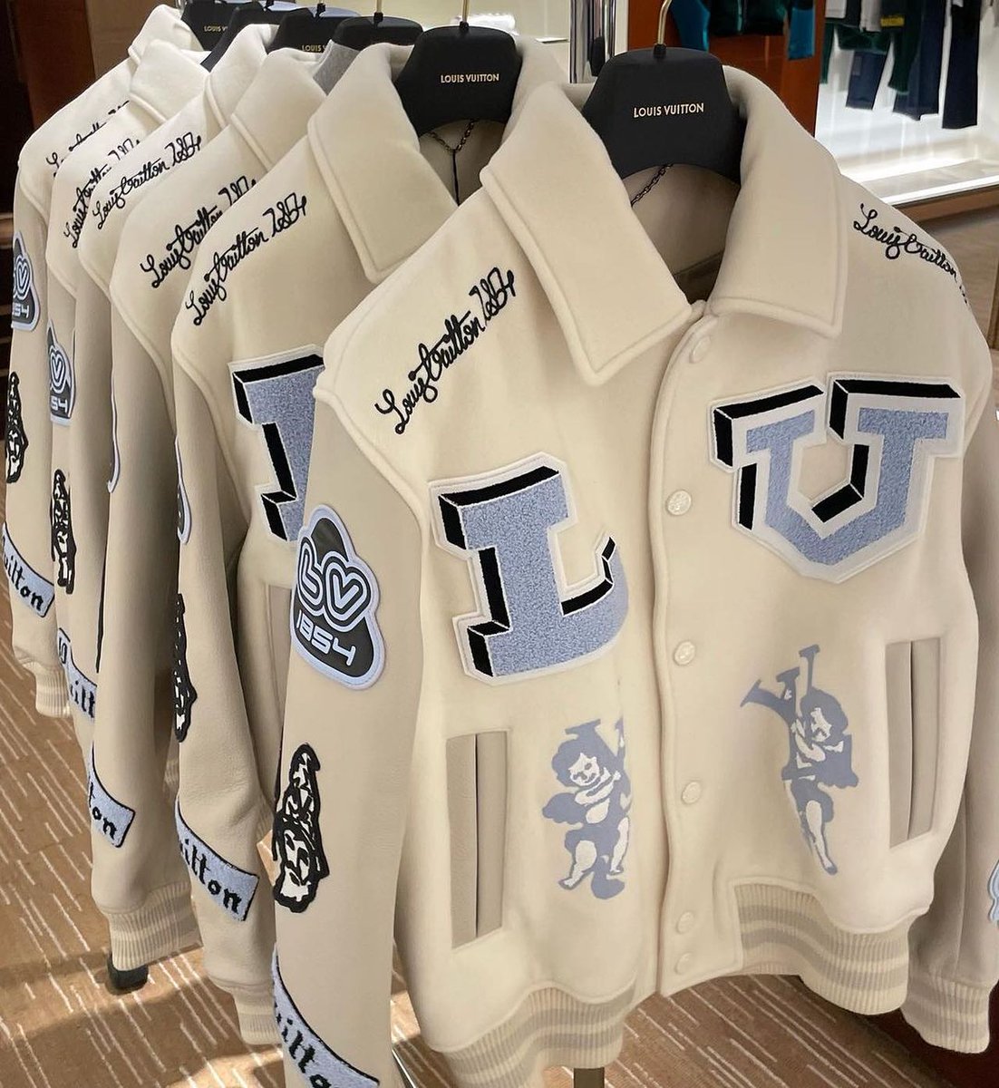 fashionsdrops's tweet photo. Louis Vuitton Fall/Winter 2022 Creme Bunny Varsity Jacket by Virgil Abloh https://t.co/j6icZA4TtH
