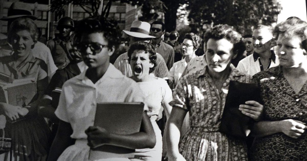 JonesForAR's tweet photo. 65 years ago today, a former governor used government resources to keep us divided. Orval Faubus hid behind the words “keeping the peace” to justify preventing integration of Little Rock Central High School. https://t.co/Ojd5Ct1HiN