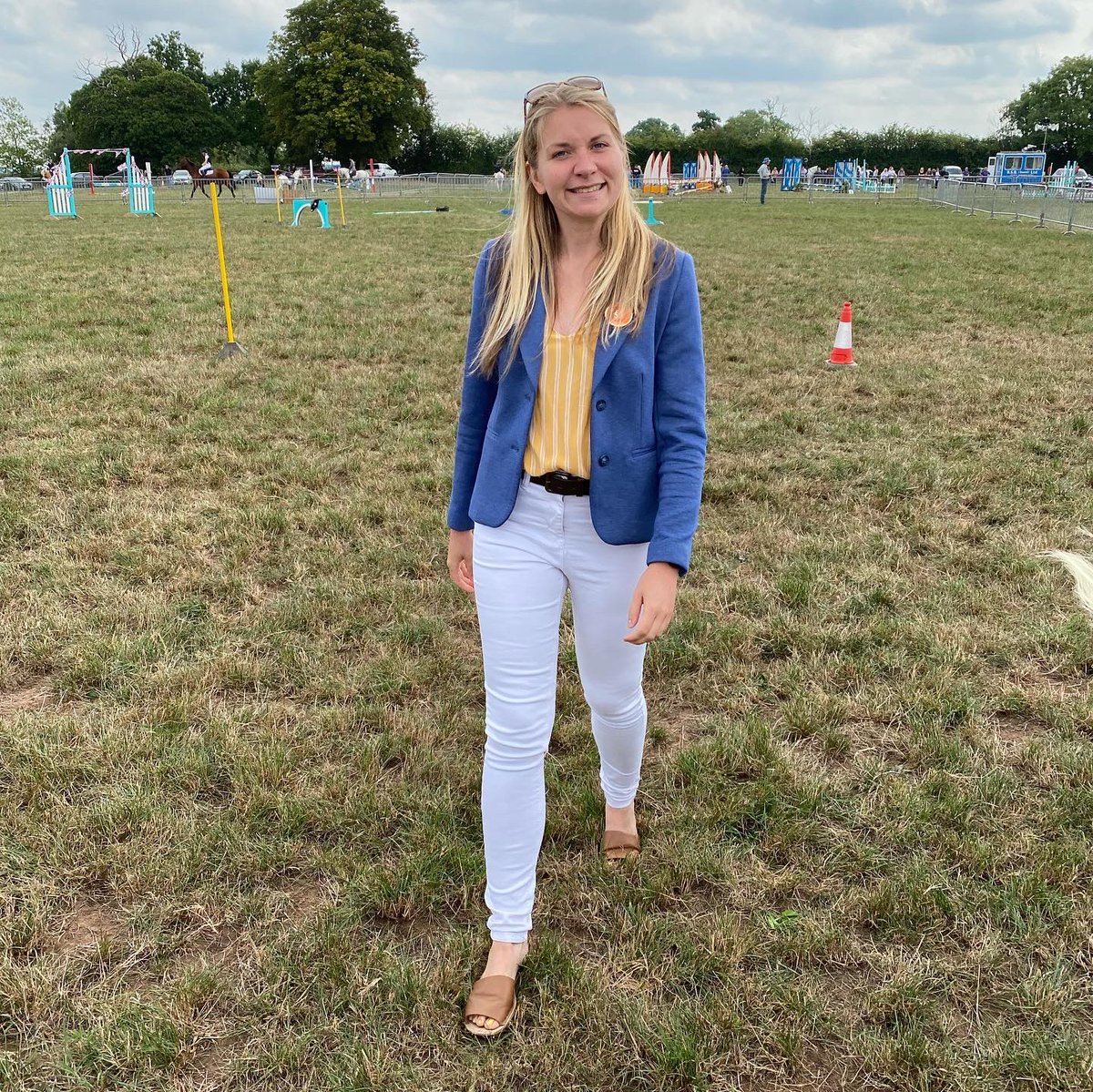 StaffordGrammar's tweet photo. On behalf of SGS, Miss Millington was delighted to award some rosettes at Eccleshall Show yesterday in the Equestrian rings. It was fantastic to see our banner proudly displayed in the main ring! #SGSDifference #SGSEquestrian https://t.co/jGo0GUwmuE