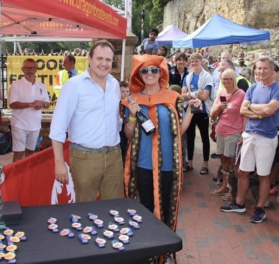 Delighted to win Best Dressed Team at today's Dragon Boat races. <a href="/TomTugendhat/">Tom Tugendhat</a> I'm sure it's not often you get to have your photo taken with a squid 🦑🙌(Photo from <a href="/TonbridgeLions/">Tonbridge Lions</a>) 
Thank you to all who cheered and donated, we are so grateful 🧡 cafdonate.cafonline.org/20829?fbclid=I…