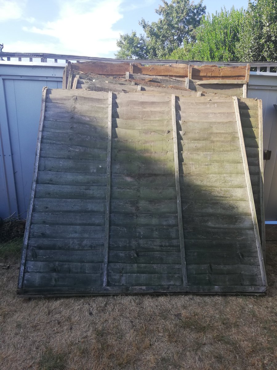 OneGP5's tweet photo. My peace is a little DIY. So was challenged to turn this pile of old fence panels into a den for the grandson. Not finished, but he's already moved in! #DIY  #peace #lifeworkbalance https://t.co/0wDyEh2K9T