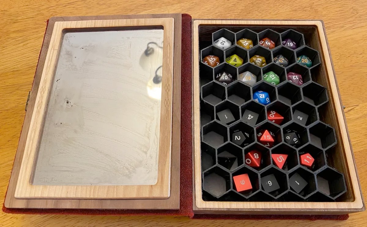 LivingDice's tweet image. I made an update to my Spellbook from @ElderwoodBoxes to  add a 36 slot honeycomb to protect my #rpg dice from hitting each other. I also posted the drawing so you can print your own if you like. printables.com/model/271249-e…