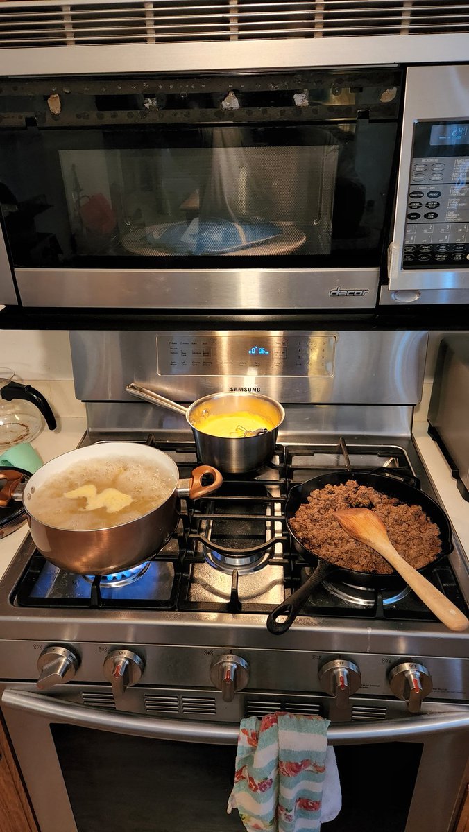 Making "Daddy helper". It's homemade hamburger helper, and the kids love it.