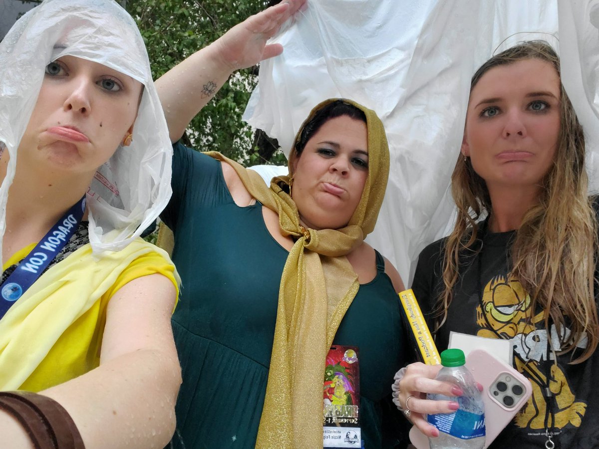 whitefire33's tweet photo. When you are so dedicated you stand in line for the McElroy panel for two hours in the pouring rain. So our question is which of you is buying the beer? #McElroyDC @mnb_229 https://t.co/nLiH9hD55X