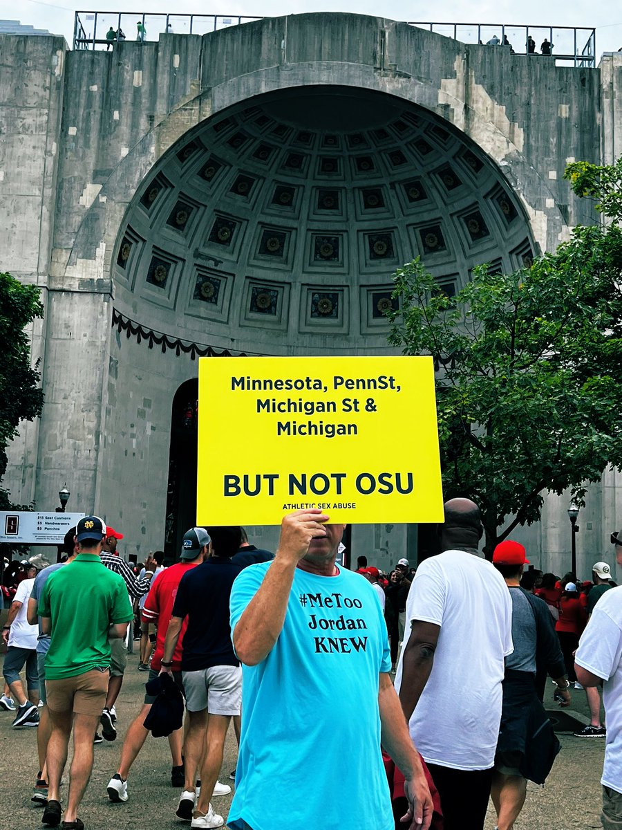 RealTamie's tweet photo. Retweet if you believe male sexual abuse needs to be addressed.

I stood with the Ohio State wrestlers at the Buckeyes football game. Jim Jordan knew of the sexual abuse and did nothing. He looked the other way. He covered it up. 

Spread the word. We need Justice for the abused! https://t.co/yjn5OXxdoV