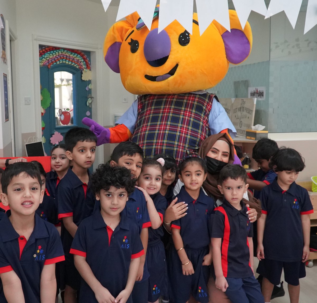 AISsharjah's tweet photo. Look who visited our ELC students in class today! Students were very excited to see Wattle - Australian Pavilion mascot in AIS uniform on their first day of school. #aisbacktoschool2022 
#Expo2020australia #australianpavillion @IanHalliday29 @AusCG_Expo2020 @TIQ_UAE https://t.co/PMd2z4OsCz