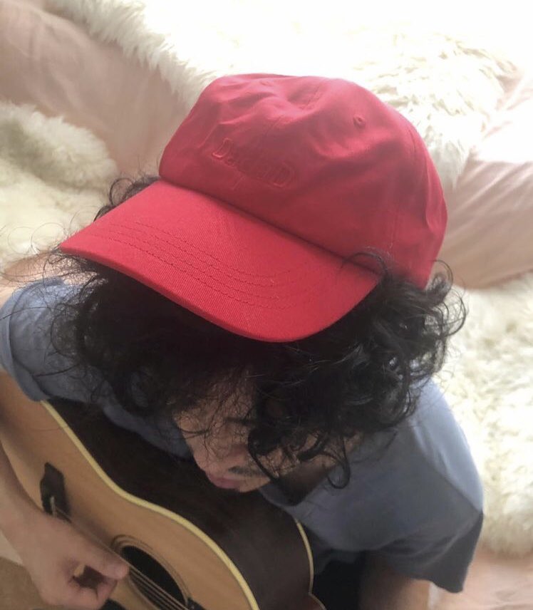 hellkuni's tweet photo. DadaDキャップです。もじゃもじゃヘアーでもしっかりと被っていただけます。我々わりと大人なのでロゴの主張は最小限にしてます https://t.co/svLAnn56QE