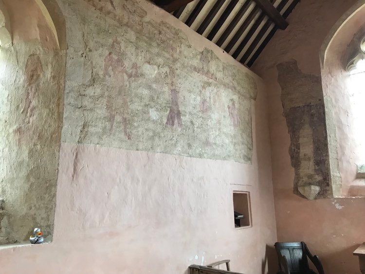 PublicPast's tweet photo. In this penultimate week before the symposium, Sir Quackalot has taken some time to reflect in St. Oswald's Church in the deserted medieval village of Widford, Oxfordshire. First built in the 13th C, its walls are still adorned with the remains of a series of 14th C paintings https://t.co/V4RN9dIOXw