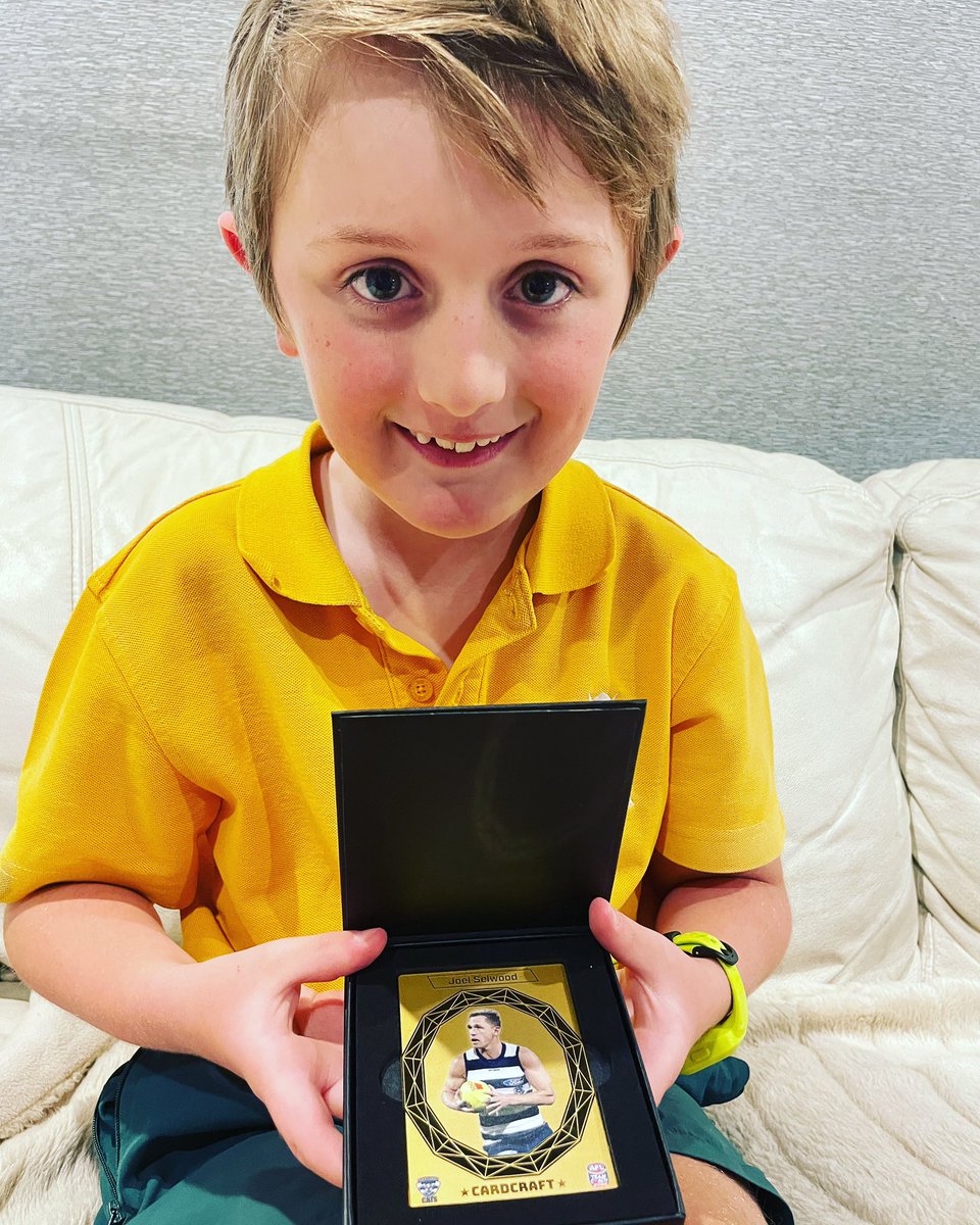GrantSchubert14's tweet photo. Safe to say the little fella is pretty happy with the new arrival of his @joelselwood14 24k Gold Cardcraft card. Definitely top of the collection. #aflfootycards #afl #geelong #14 #teamcoach #gold #cardcraft @GeelongCats #joelselwood @AFL #teamcoach https://t.co/HZhgoSPUpQ