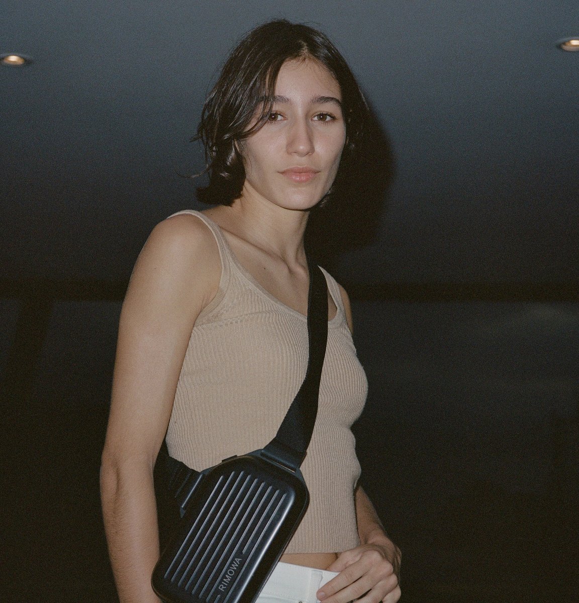 リモージュ　バッグ The RIMOWA Sling Clutch in Black captured by Leeroy Kim in Rio de