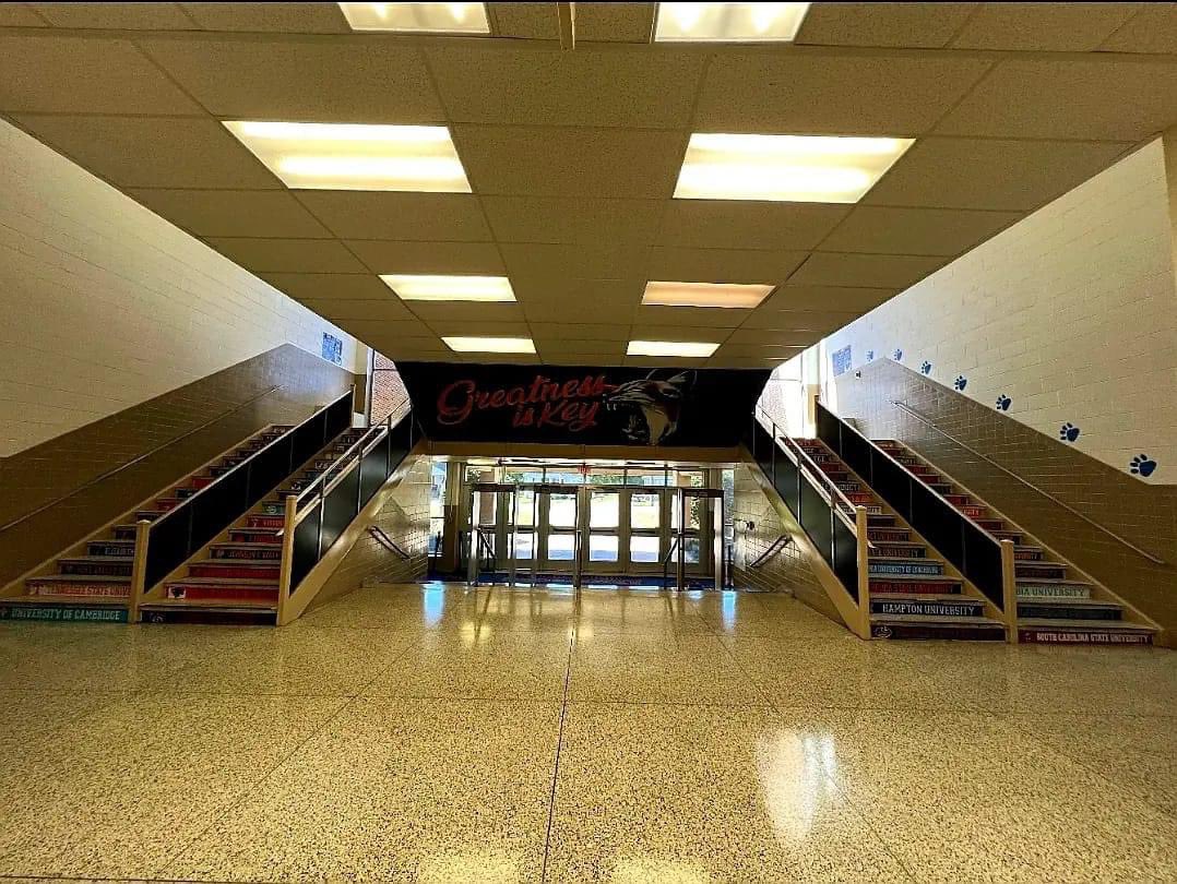 mrsblandrva's tweet photo. How cool is this staircase at Armstrong HS? I spotted my alma mater. 🖤💛🐏 #GreatnessIsKey https://t.co/fXyAS8GVbT