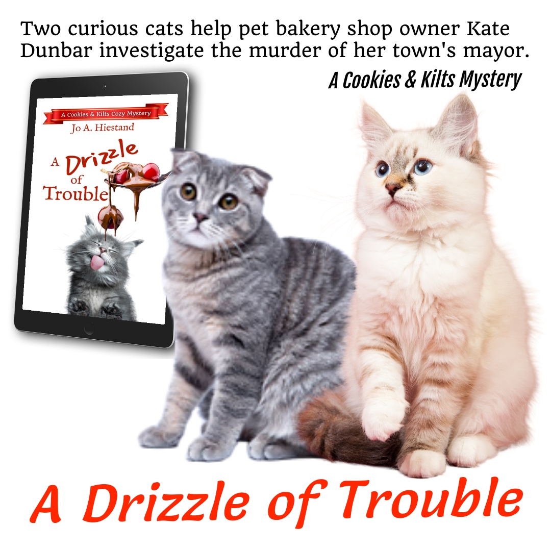 Two curious cats help pet bakery shop owner Kate Dunbar investigate the murder of her town's mayor. #bakeryCozy #PetsCozy #PetBakeryCozy #DogAndCatCozy #CozyCrime #AmateurSleuth #KindleBooks  amzn.to/3t4o3T1 johiestand.com