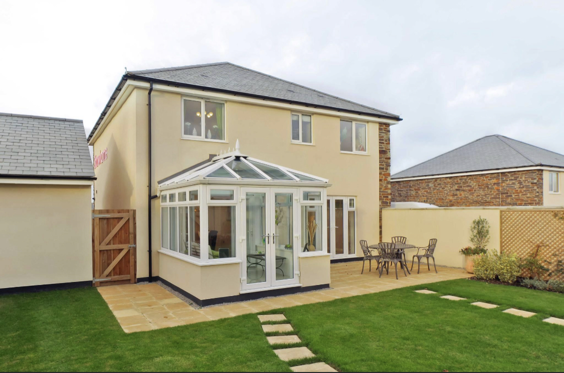 This conservatory with patio doors blends in seamlessly with this property adding some much needed space whilst creating a perfect gateway to the garden. #conservatory #garden #home #homedecor #homeimprovement #interiordesign #renovation #windows #conservatoryroof #doors