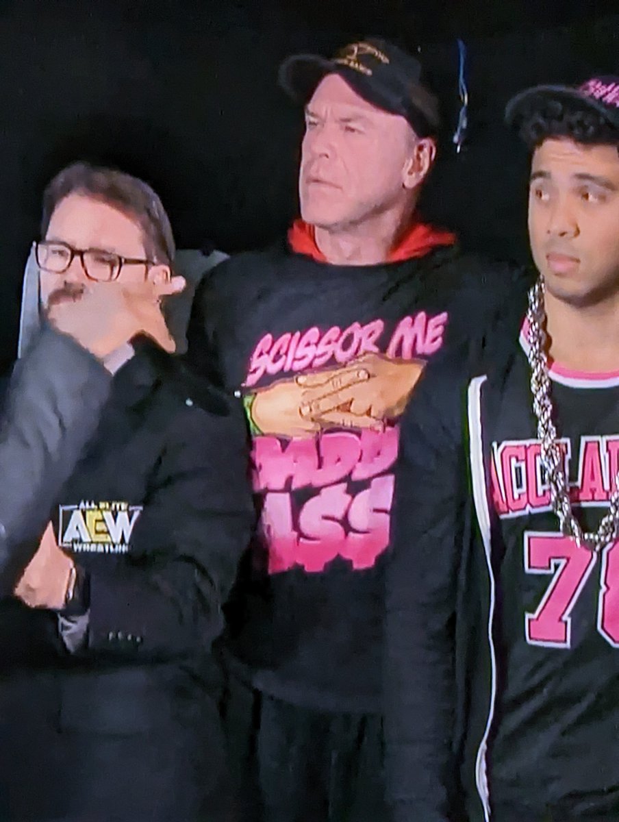 Nomtastic's tweet photo. When I asked Billy Gunn to take a photo with the Bunny Ears he asked if it was "some weird thing that was going to get him in trouble on the internet" 

Now he's wearing a shirt that says "scissor me daddy ass" https://t.co/PdE5egIiEu