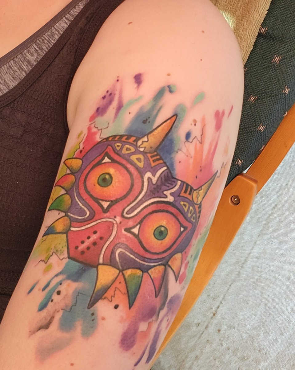 ShmickyD's tweet photo. New birthday tattoo! #tattoo #legendofzelda #majorasmask #n64 #tattooideas #watercolor https://t.co/i5UXiv1Hig