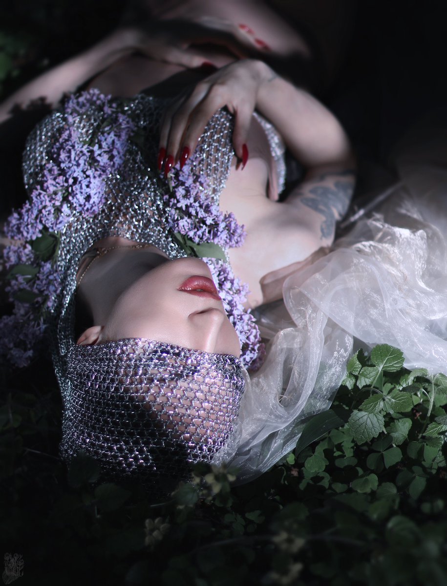 Lilac Silver. A sister of secrets, speaking with a cold mind and listening with a pure heart. The alien abode of viscous greenery becomes close, sparkling with evening light, in which lilac flowers grow surrounded by mist...

From my photo series "Lilac Silver"
June 2022