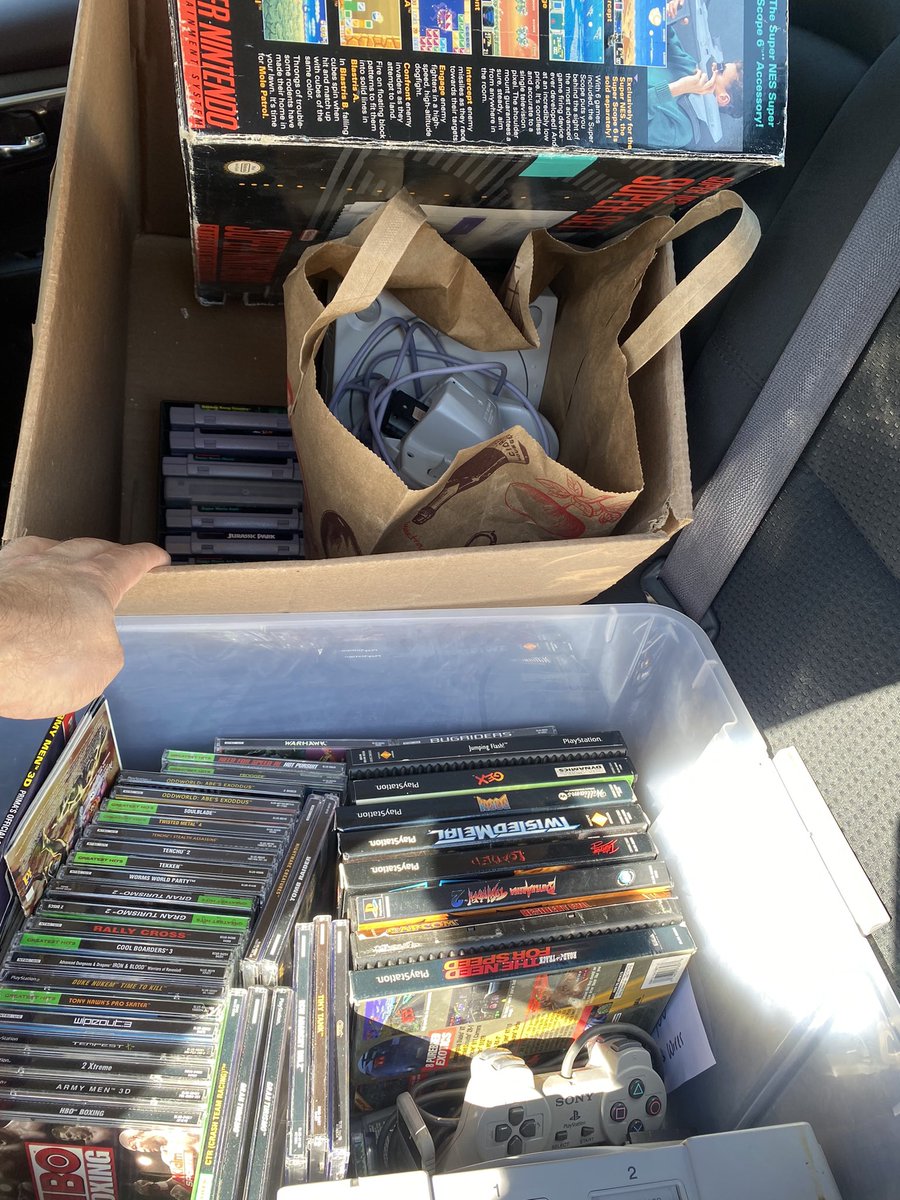 VDOGameHoarding's tweet photo. Random Labor Day garage sale, SNES, PS1, Dreamcast, and a lot of games. Not sure how this was still out hours after the sale started but here we are! #retrogaming #gaming #playstation #ps1 #snes #supernintendo #residentevil #retro #oldschool #gamer #garagesale #garagesalefinds https://t.co/JPFSfG9qYK