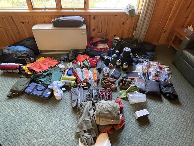 All our camping gear, tent, clothes, sleeping bags spread out waiting to be packed. Will it all fit?