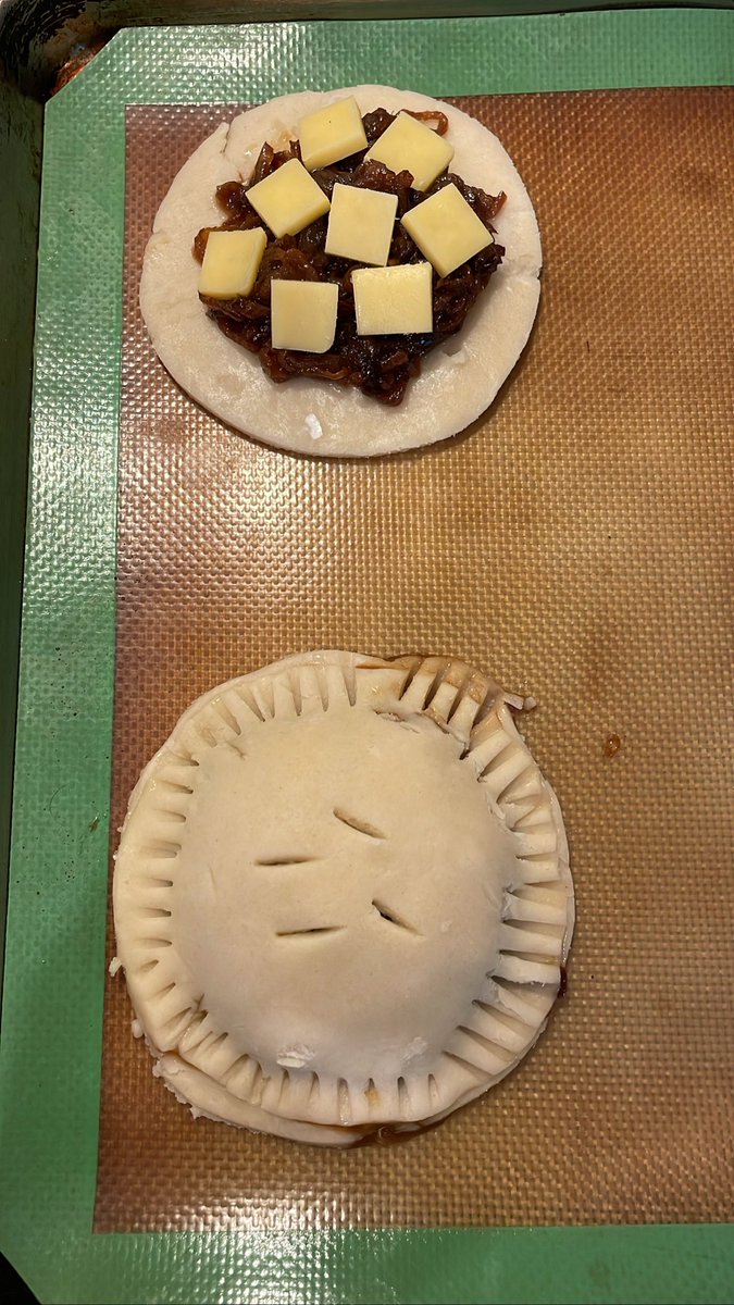 NLSchoenecker's tweet photo. My contributions were inspired by @sarastipsypie: bourbon pecan pie and caramelized (with beer) onion Gouda hand pies https://t.co/Mf89UYY74V