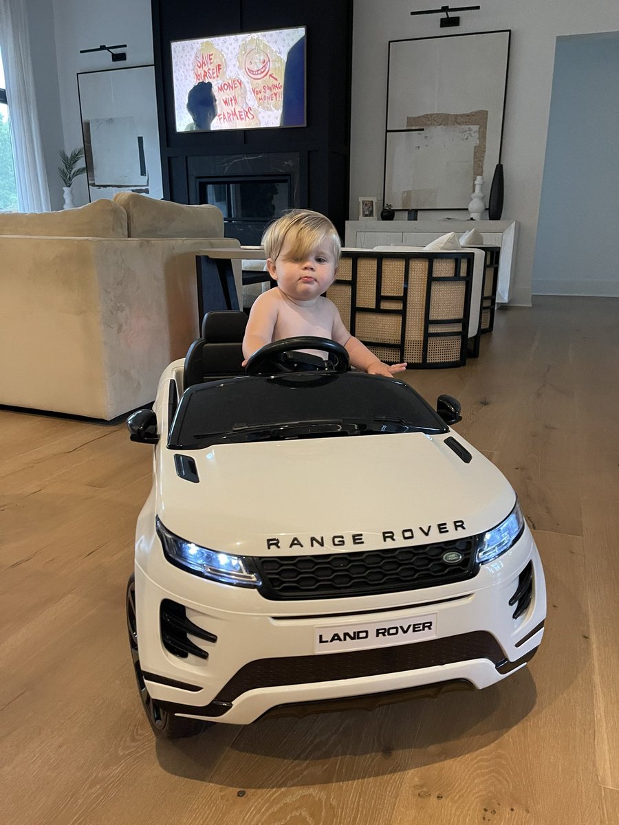 KendallSnyder's tweet photo. When my kid is acting wild before bed I’ll crack a beer, throw her in the Rover and drive her around the living room. Save your judgement https://t.co/L8sraVHtzT