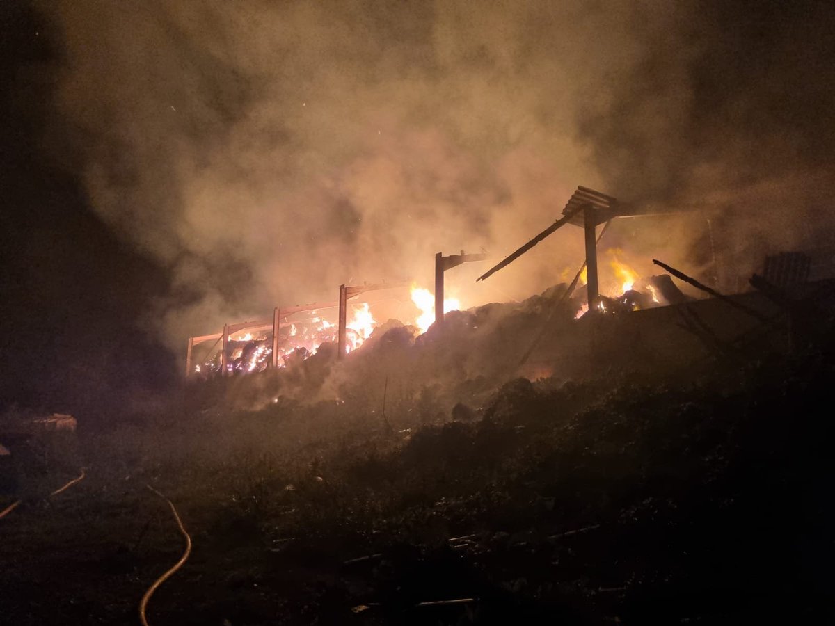LFRSFireControl's tweet photo. .@LeicsFireRescue are in attendance at a large barn fire in Charley nr Shepshed. This can be seen from a distance but please be assured that we've have crews in attendance since 19:00hrs last night and this is a quantity of hay and straw being allowed to burn under supervision. https://t.co/4Tj2eFRMFv