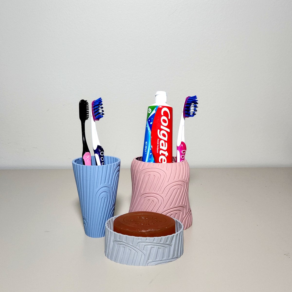 3DPrintBunny's tweet photo. Been working on some Art Deco inspired designs and these ones make up my Bathroom Set. I also think the pink one might make a cool pencil pot.

Printed using the @spidermaker_3d matte PLA range.

Available on my @Thangs3D profile here: https://t.co/mVMP1nw6K6 https://t.co/UcLrwWpVcU
