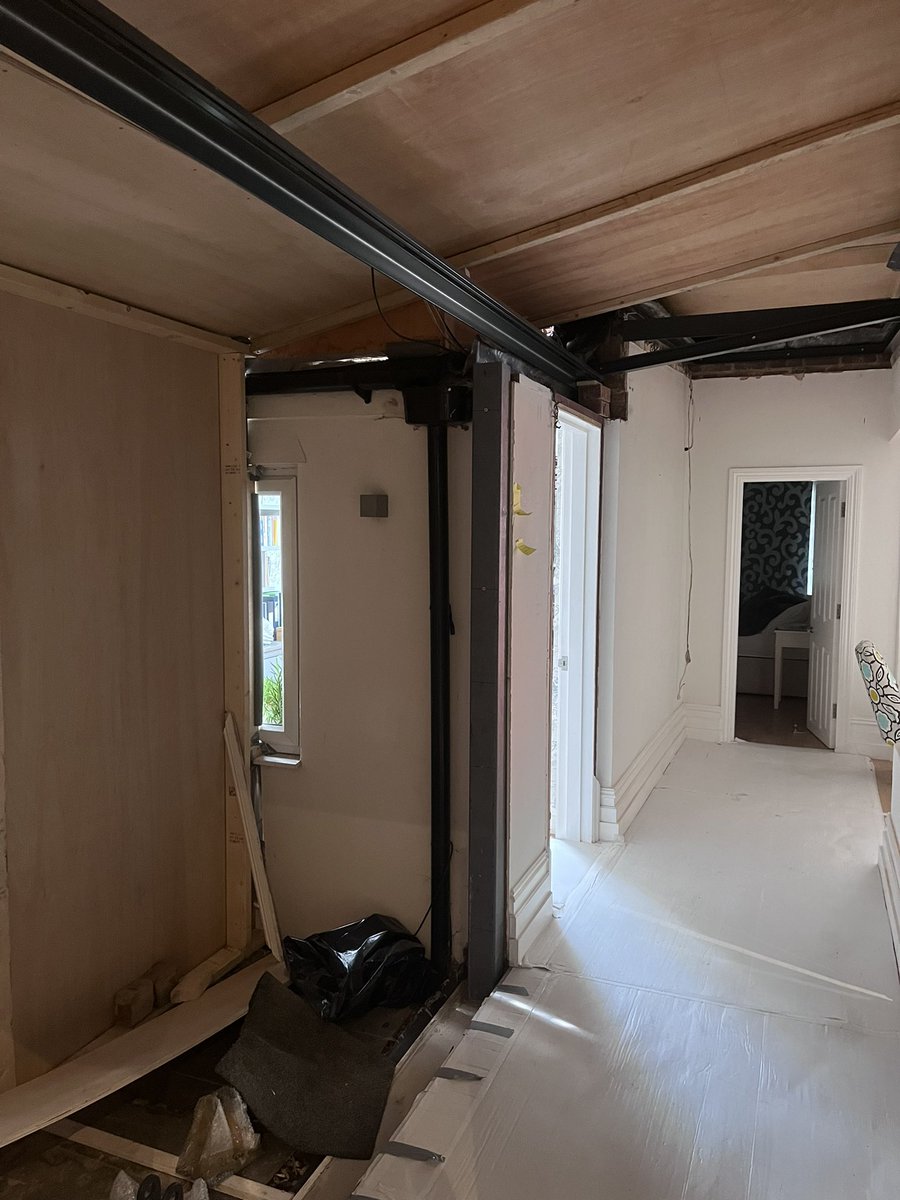 Melanievarley's tweet photo. @IQGlassUK love your work but please pull your finger out on our job IQ3644 Parkside, we have been living with the side of our flat like this since March due to constant delays and winter is coming https://t.co/cC0tlGsqFb