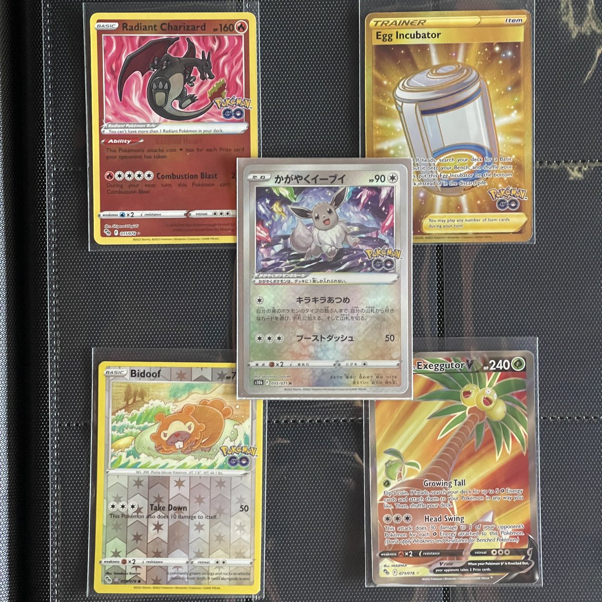IanwithIan's tweet photo. Just some 🔥🔥🔥 from this weekend’s PoGo opening!
Watch the moment it happened:https://t.co/rndm1Jwv6m
#pokemon #pokemoncards #pokemontcg #pokemoncommunity #pokemongo #charizard #eevee #pokemongold #pokemonfullart #alolanpokemon https://t.co/8ksk2vw4CG