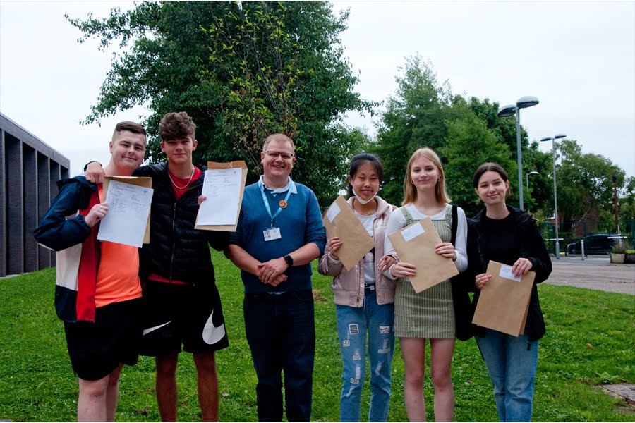 Principal @MrBeard_Coop celebrating with some of our Year 11s today. Read more about our results bit.ly/3QOr5Ew #GCSEResults2022