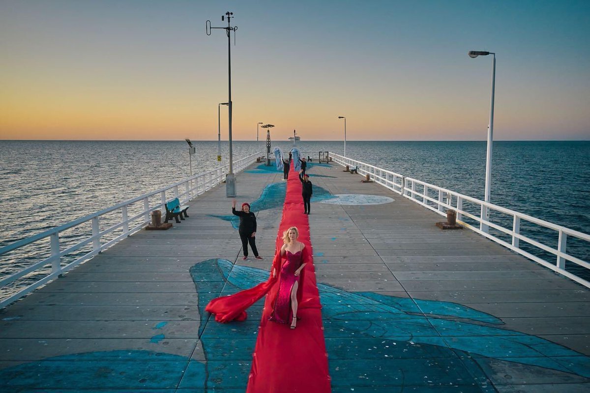 WestAustralia's tweet photo. Rolling out the ❤️ carpet @MargaretRiver-style for this week’s @cinefestoz… 1.8km out to 🌊 on @BusseltonJetty! 🐋

#WanderOutYonder #SeeAustralia https://t.co/UTbztG9PbB