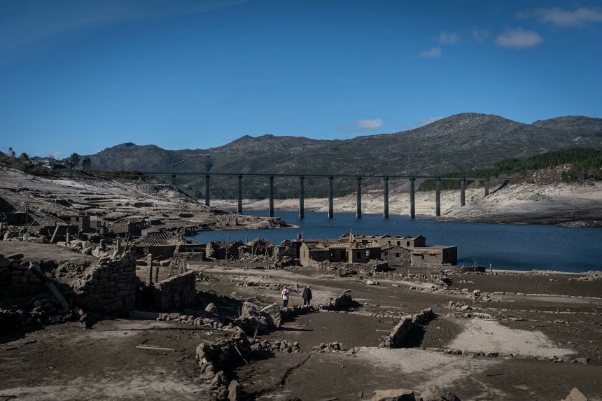NBCNews's tweet photo. In Spain's northwestern Galicia region, a forgotten village has emerged from the Limia River due to drought. https://t.co/8A3UwzmAnI