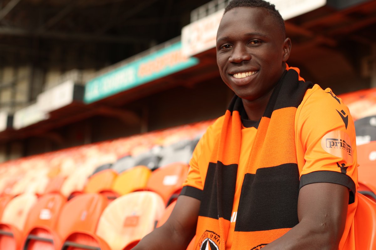 festoweb's tweet photo. Anaku Ada Sadat Happy,Officially joins Dundee utd on a two year deal taking jersey 20 and could be available for selection against Motherwell. Thank you @KCCAFC @OfficialFUFA @NCSUganda1 #MistersoccerFrancisGlasman @russell_pointon #GGFI @dundeeunitedfc https://t.co/Nzswu62c8p