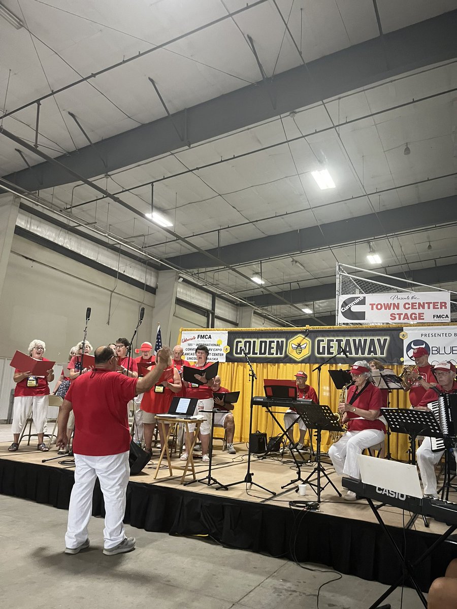 FamilyRVClub's tweet photo. Good morning from the Roadmaster Coffee Hour! Come join us at the FMCA Town Center for coffee and doughnuts 8am-9am every morning. 

The Frusrated Maestros are also playing at the Cummins Town Center Stage! 

#fmcaNE22 https://t.co/XGPVQUhYn4