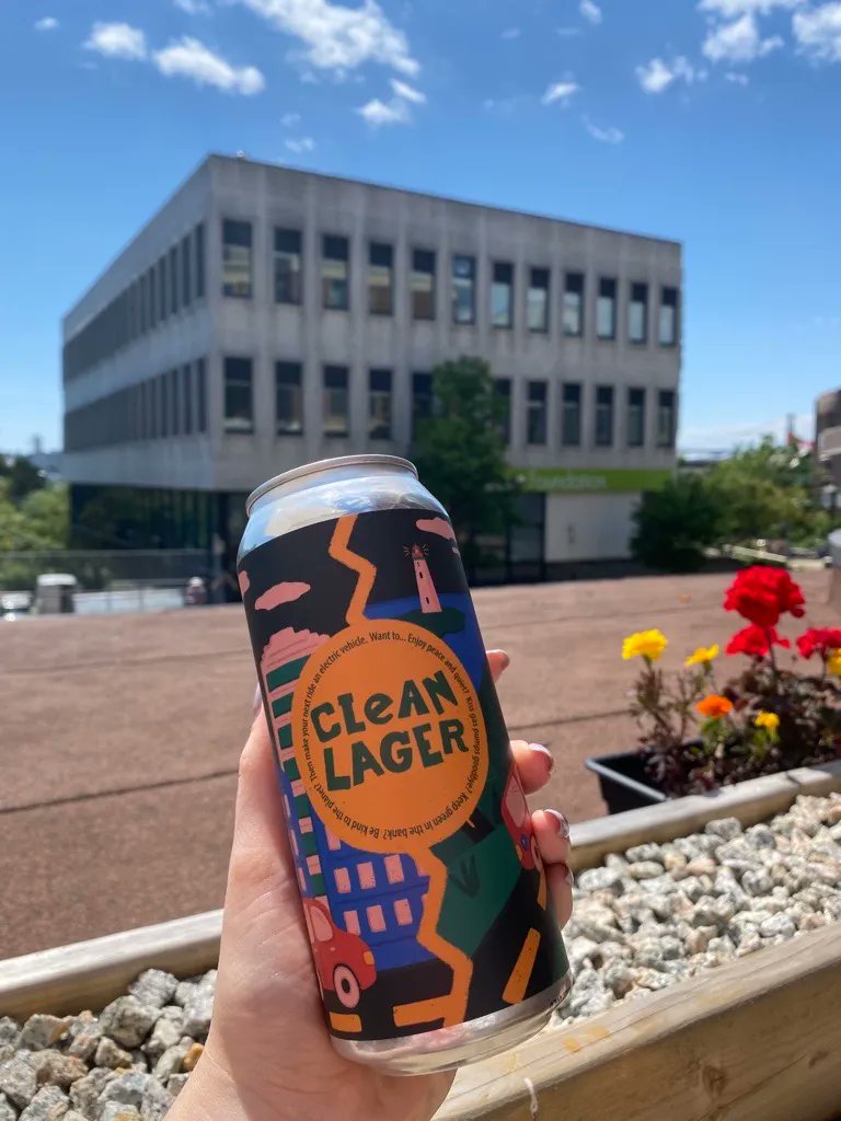 “There aren’t many issues that affect everyone the way climate change does. I’m optimistic that we have the potential to unite people and change.”

Emily Clark paired her passion for art with her desire for change to create our Clean Lager Transportation label. <a href="/NewScotlandCo/">New Scotland Clothing Co.</a>