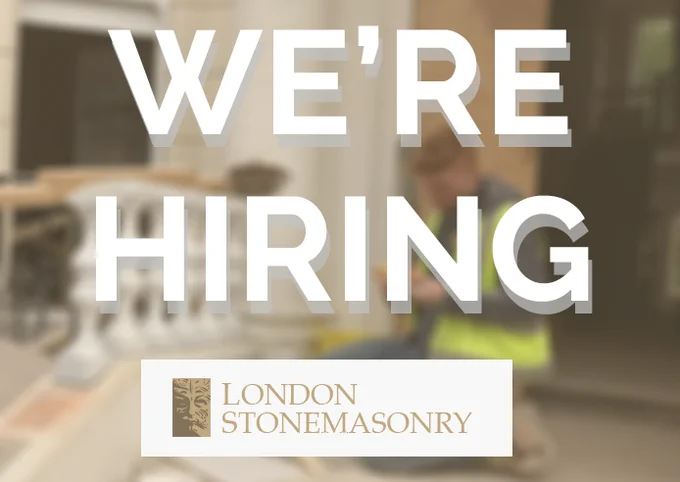 A sign saying "we're hiring"