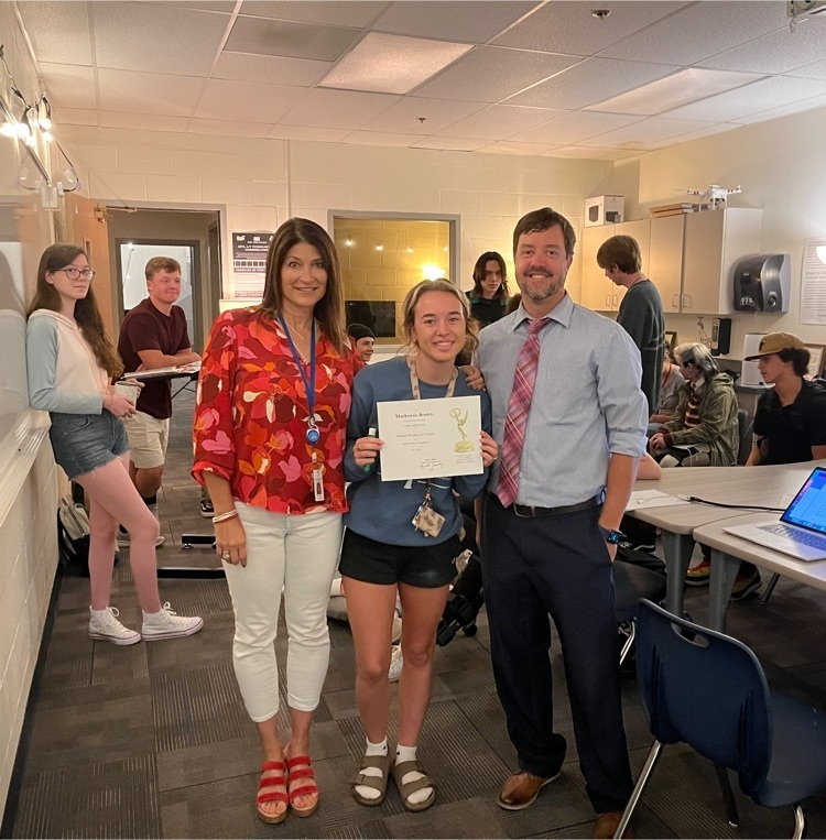 CodyHighSchool's tweet photo. Mackenzie Brown, the newly-appointed Lead Producer of CHS Wired (with Logan McLeod) is accepting her official certificate celebrating her nomination for a student Emmy award for her piece, “Ice Cats,” featuring Cody’s ice hockey team. Congrats Mackenzie. Go Broncs and Fillies!!! https://t.co/Kx2ckWhb8q