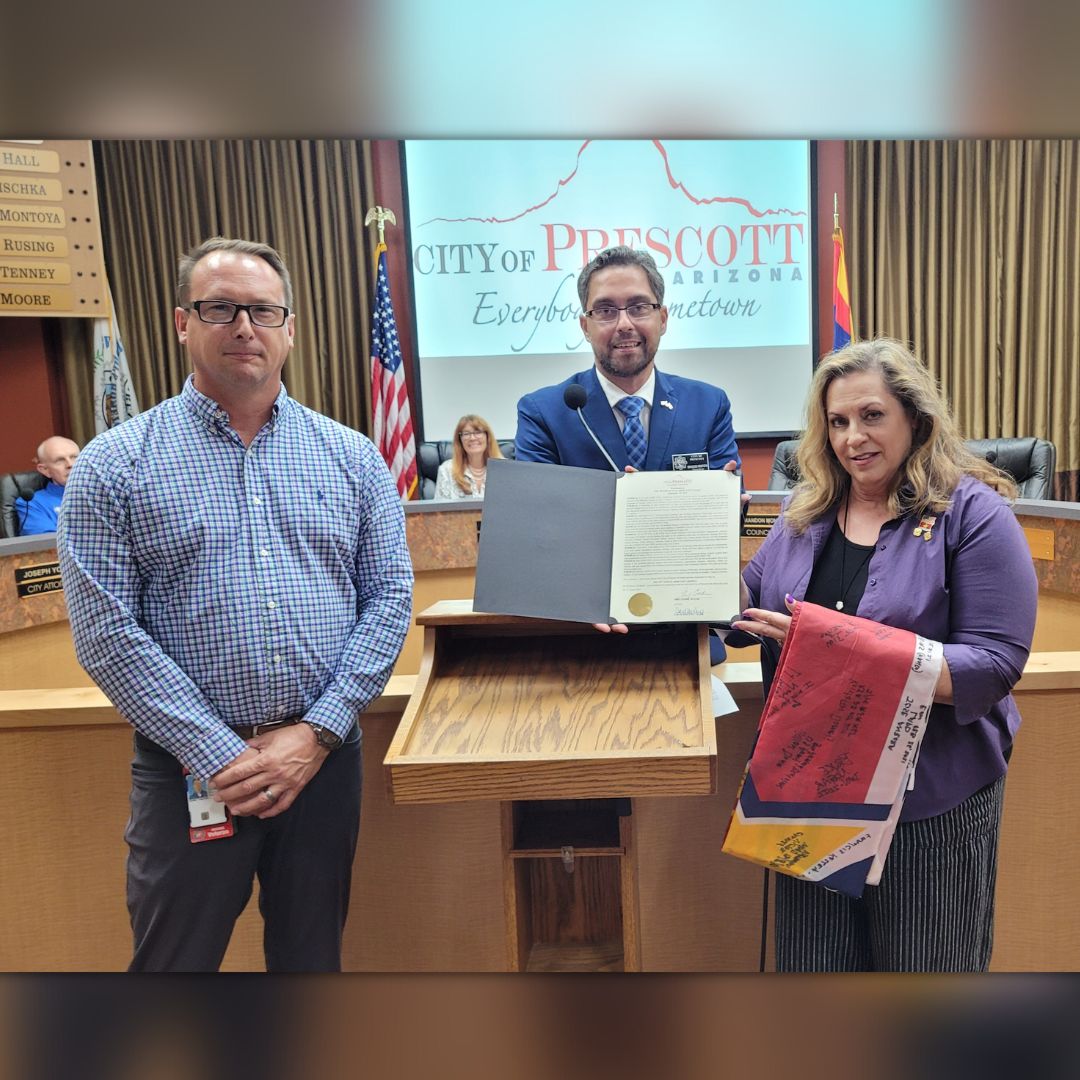 HopeFestAZ's tweet photo. Councilman Brandon Montoya with the Mayor’s Proclamation. The City of Prescott for officially recognizing Sept 10, 2022, as @HopeFestAZ – LOVE First Day! #HopeFestAZDay #LoveFirst #911Memorial #ExperiencePrescott #ArizonaFestivals #PrescottPD #PrescottFire #PrescottMayor #NAZVA https://t.co/24Pz4b6KNP