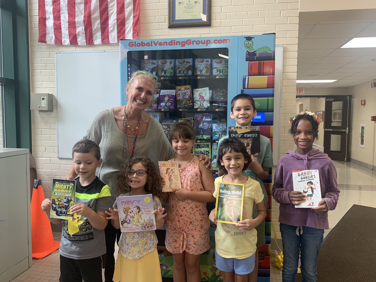 D123Sward's tweet photo. Ribbon cutting for our very own BOOK VENDING machine 📚🎉. Thank you to our Sward PTA and the D123 ED Foundation for supporting this student centered initiative. @d123_ed @MrsKramerD123 @GlobalVending #bookwormmachine #keepkidsreading #books #d123 #swd123 https://t.co/bzhJG5hHtZ