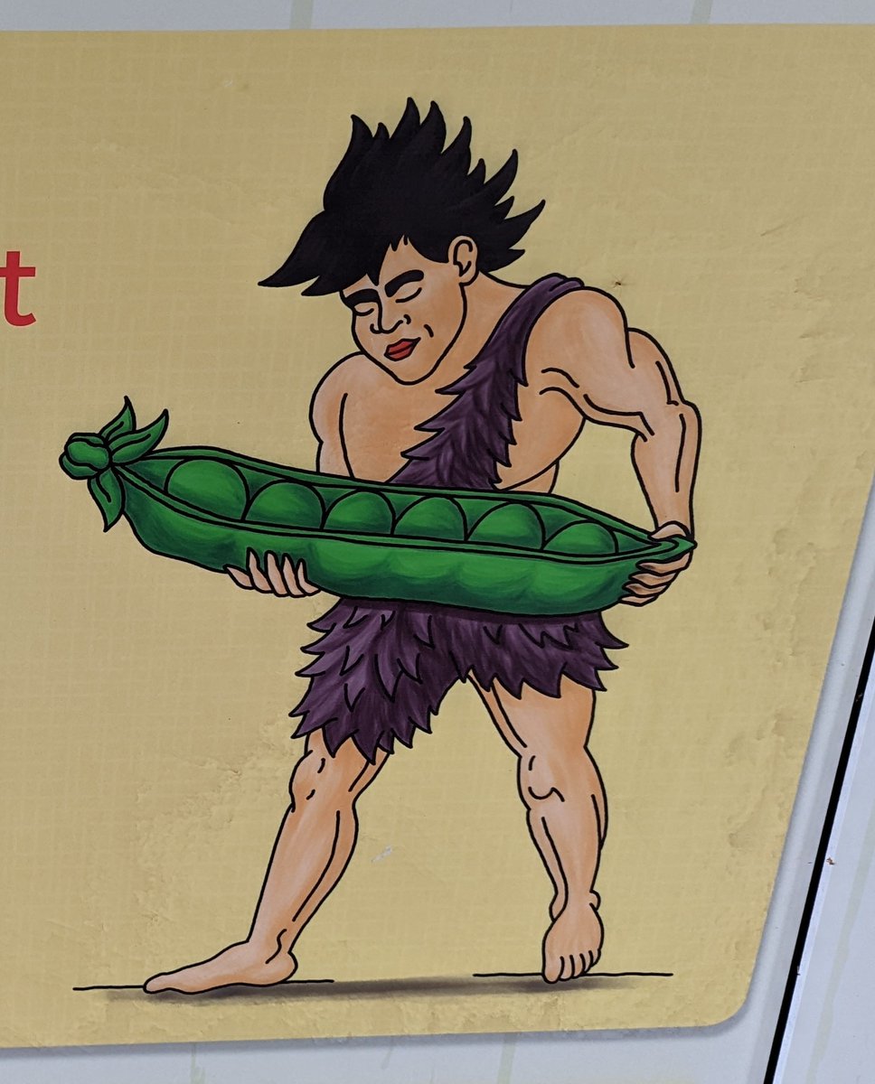 Spotted at the state fair: Goku with his first love, a giant pea pod.