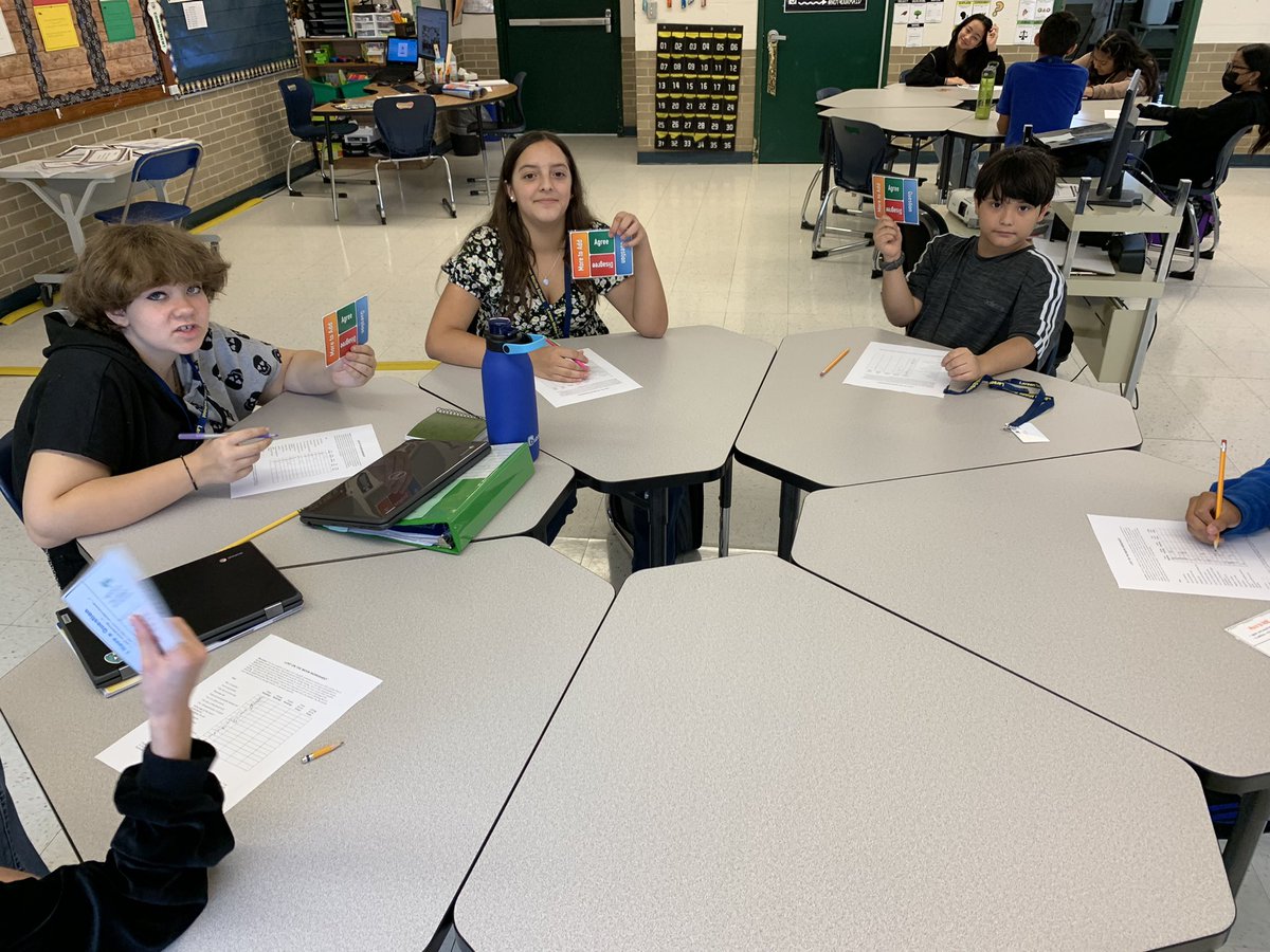 AffleckDan's tweet photo. Today in my class @LarsenMSPride we’re collaborating using @Learn_Sci strategies.  These students are using their agree/disagree cards to further discussion on our lost on the moon activity. #u46rising #collaboration #debate https://t.co/wB1Vzf5P6C